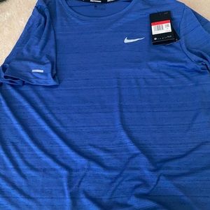 Brand new Nike running shirt, size L with tag